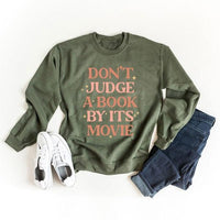 Don't Judge A Book By It's Movie Sweatshirt - Happily Ever Atchison Shop Co.