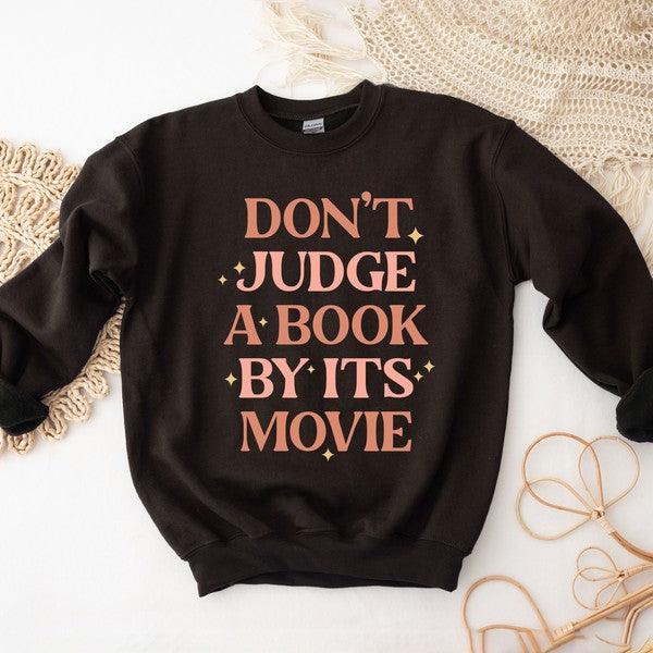 Don't Judge A Book By It's Movie Sweatshirt - Happily Ever Atchison Shop Co.