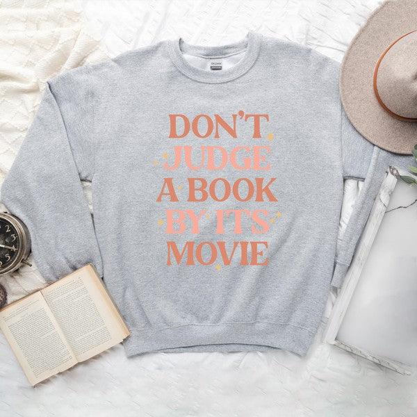 Don't Judge A Book By It's Movie Sweatshirt - Happily Ever Atchison Shop Co.