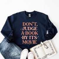 Don't Judge A Book By It's Movie Sweatshirt - Happily Ever Atchison Shop Co.