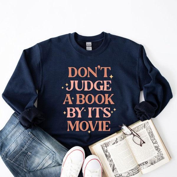 Don't Judge A Book By It's Movie Sweatshirt - Happily Ever Atchison Shop Co.