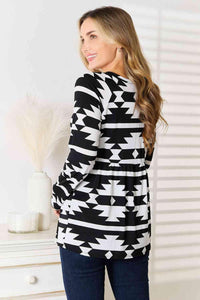 Heimish Full Size Geometric Notched Neck Long Sleeve Top - Happily Ever Atchison Shop Co.