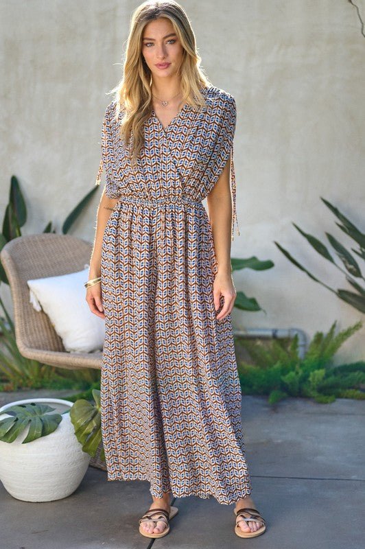 Printed V - Neck Sleeveless Jumpsuit - Happily Ever Atchison Shop Co.